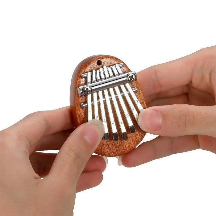 8 Key exquisite Finger Thumb Piano(Buy 3 Free Shipping Now)